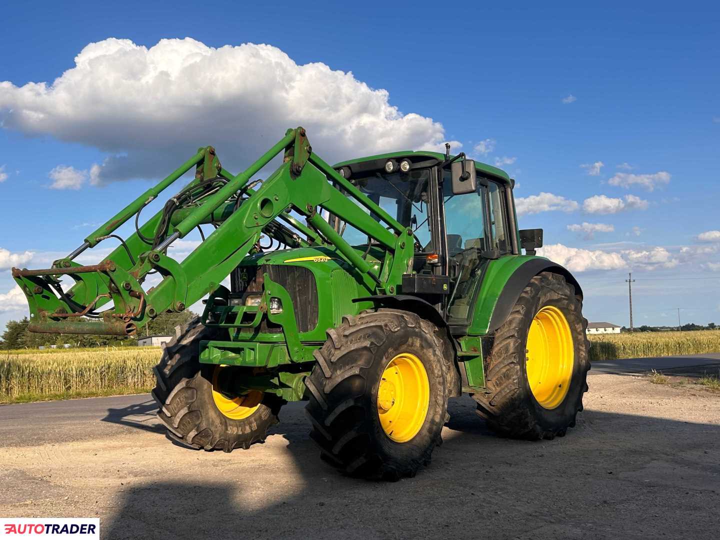 John Deere  6320 2002r.