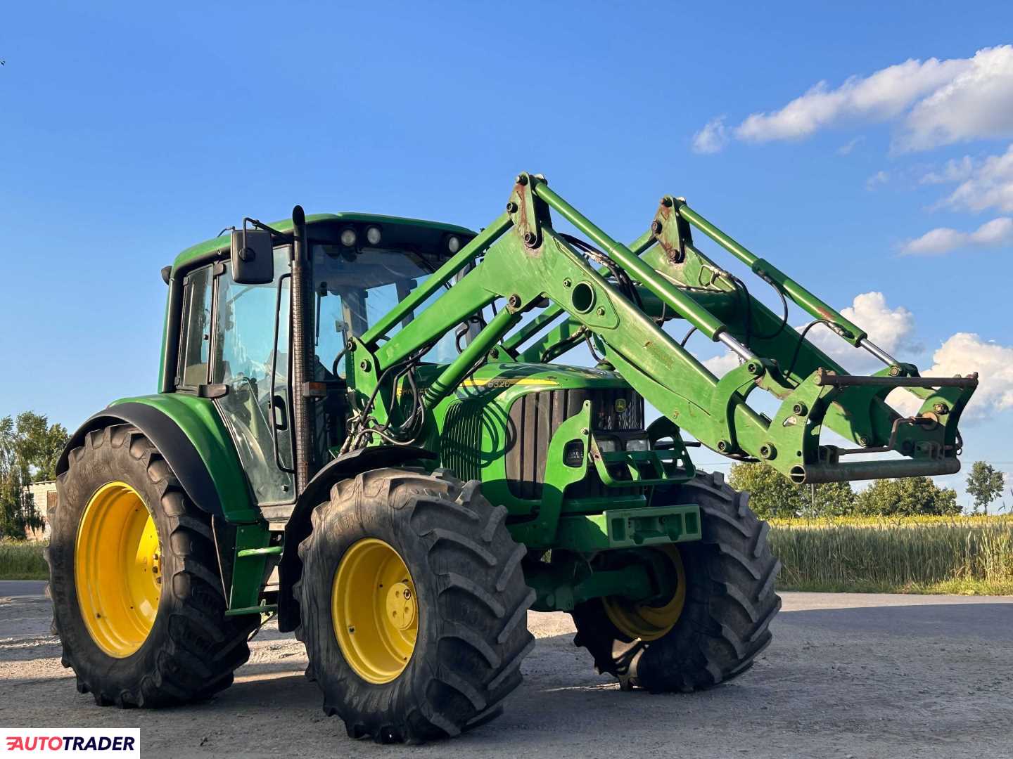 John Deere  6320 2002r.